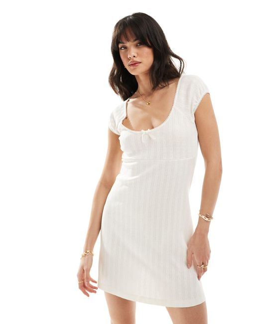 ASOS White Scoop Neck Pointelle Mini Dress With Bow Detail