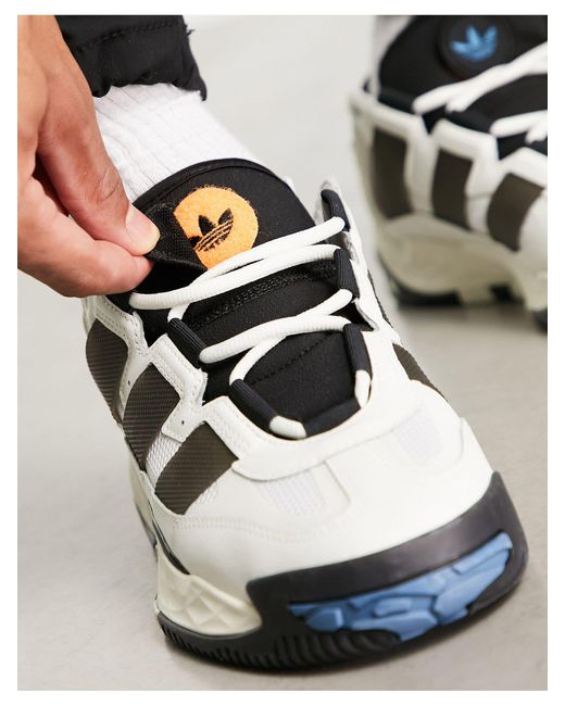 Adidas trainer bianche e cheap nere
