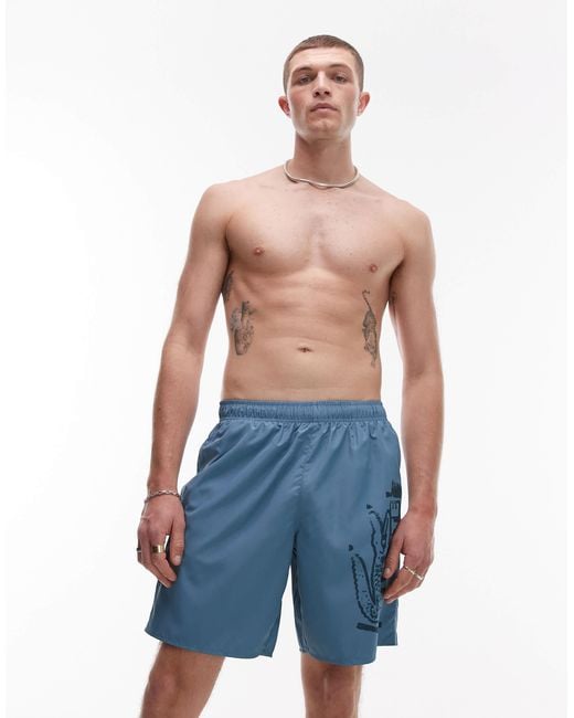 Lacoste – badeshorts in Blue für Herren
