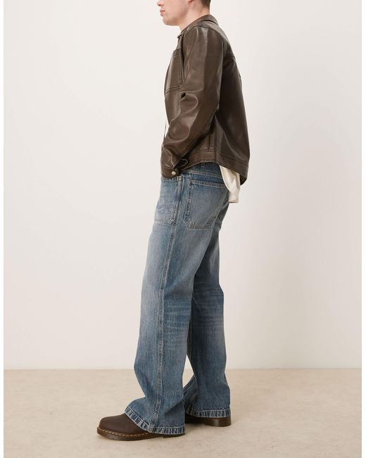 Jean ample coupe évasée à surpiqûres - moyen délavé ASOS pour homme en coloris Blue