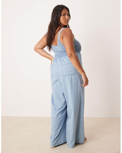ASOS Blue Asos Design Curve Soft Denim Wide Leg Jumpsuit With Shirred Body