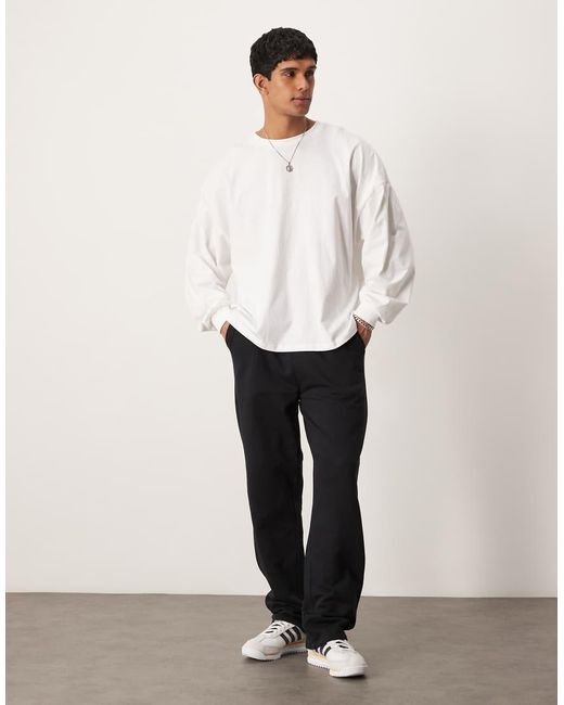 Joggers Negros Básicos De Pernera Recta De ASOS de hombre de color White