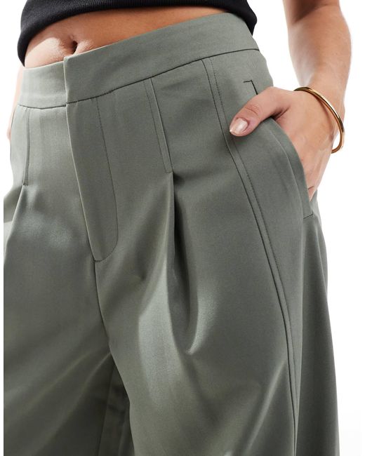 Pantalon coupe ample habillé à ourlet boutonné - kaki ASOS en coloris Gray