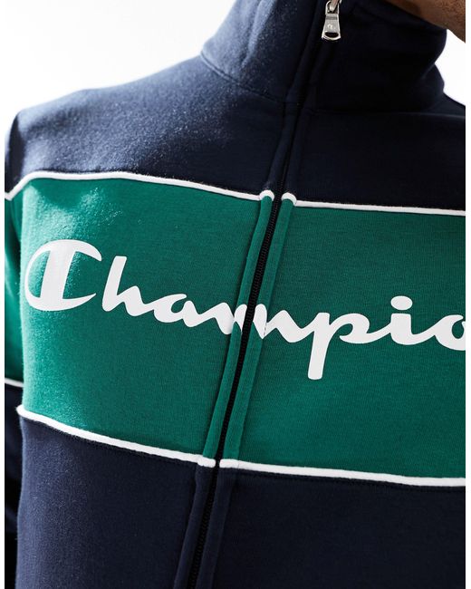 Chándal verde y con logo Champion de hombre de color Blue
