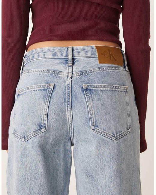 Vaqueros De Corte Suelto Y Estilo Años 90 Con Lavado Claro De -Azul Calvin Klein de color Blue