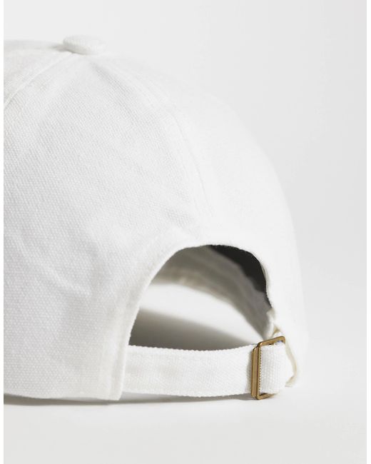 Kaiia White – kappe