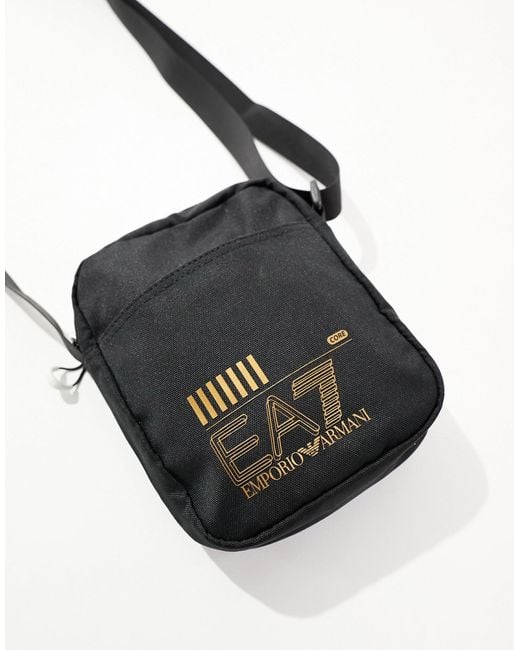 Armani - core - borsa reporter slim nera con logo dorato di EA7 in White da Uomo