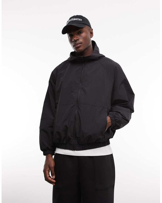ASOS Blue Stormmaxtm Water Repellent Packaway Rain Jacket for men