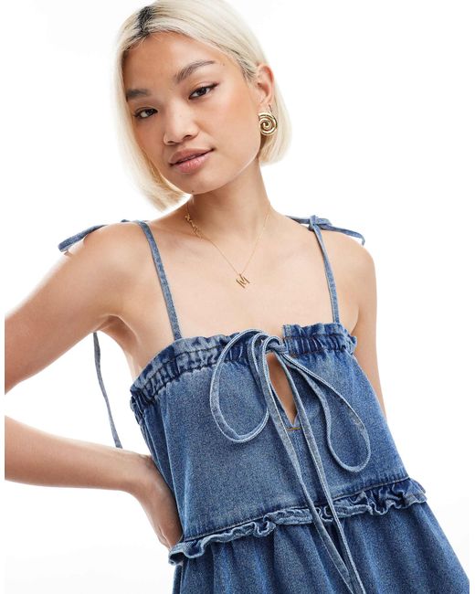 selfridges denim dress Miss Selfridge oversized tie collar sleeveless denim dress in mid wash