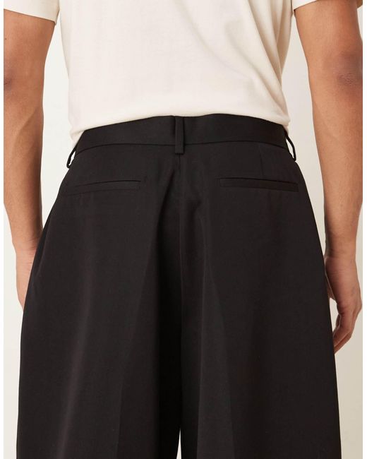 Pantalon ample et élégant à pinces ASOS pour homme en coloris Black