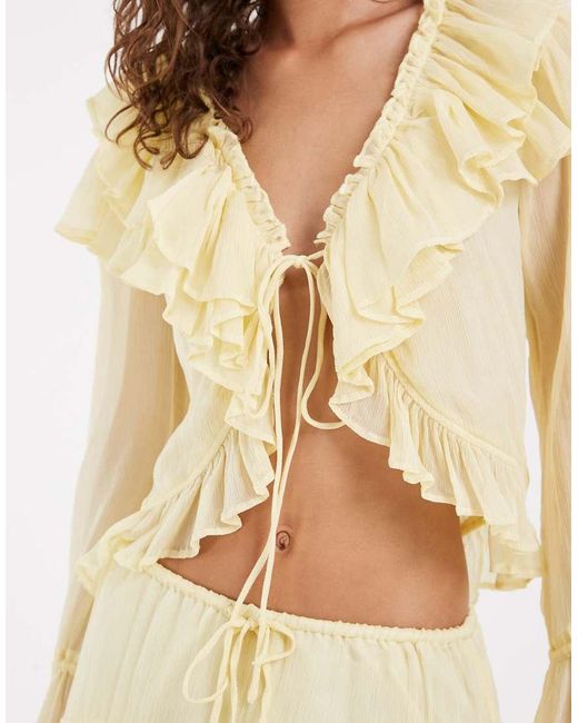 Muse Assembly Natural Ivy Ruffle Tie Front Blouse (part Of A Set)-yellow