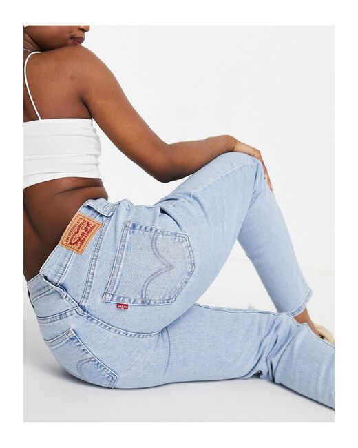 Levi's Denim Mom Jeans Met Hoge Taille in het Blauw - Lyst