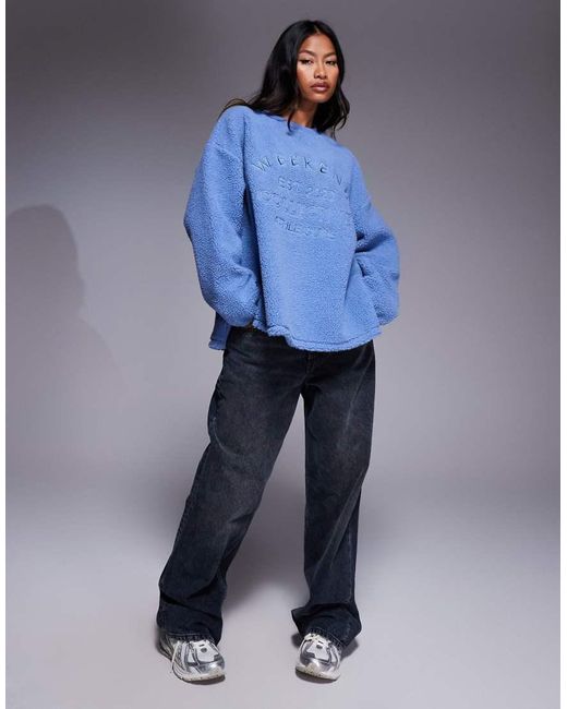 ASOS Blue Weekend Collective Borg Sweatshirt With Embroidered Graphic