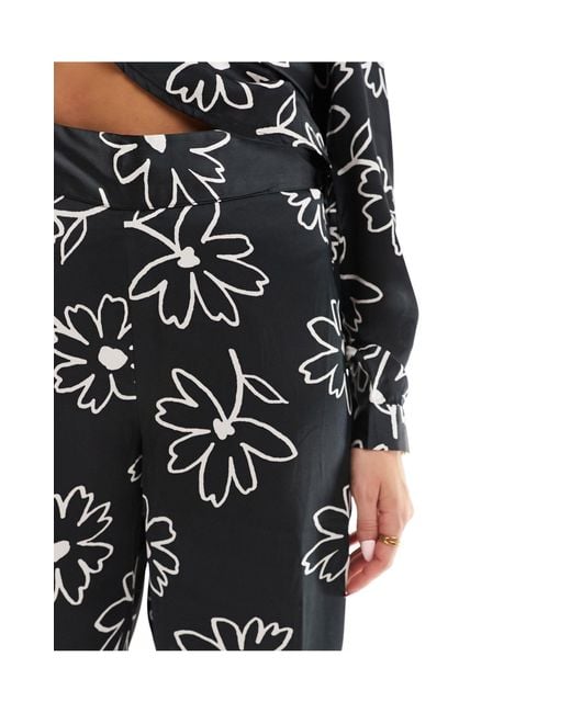 Pantalon d'ensemble ample à imprimé fleurs Jdy en coloris Black