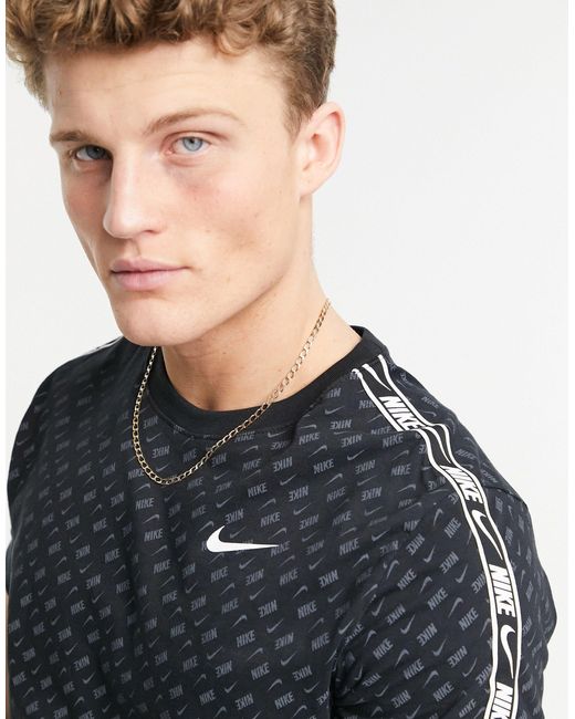 nike logo all over shirt