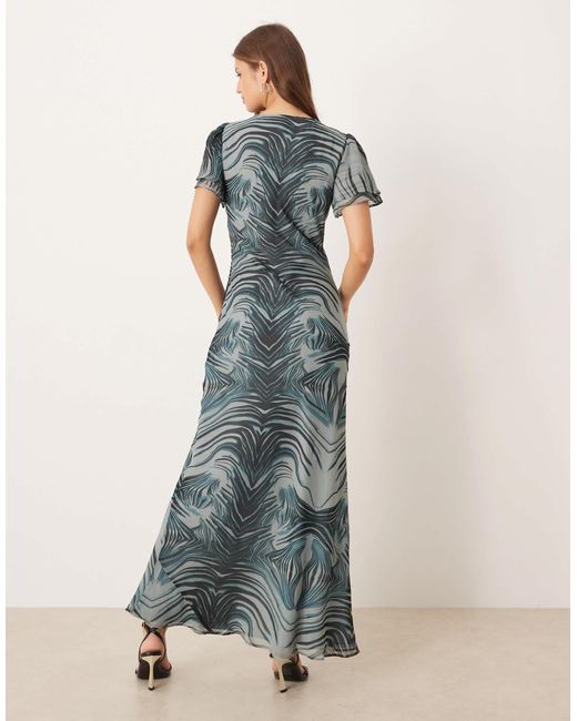 Robe longue à imprimé zébré avec liens noués à l'avant et détails en dentelle - gris ASOS en coloris Blue
