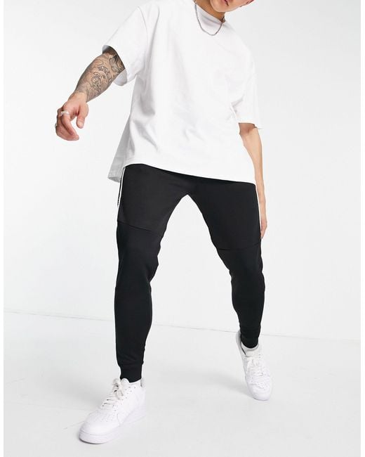 Joggers con puños ajustados en join life Bershka de hombre de color Negro |  Lyst