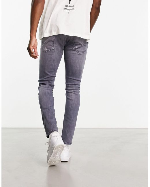 Jack & Jones Intelligence Liam super stretch skinny fit jeans with rip and  repair in grey wash | ASOS
