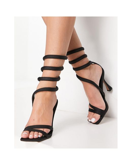 Femme Chaussures Chaussures à talons Sandales compensées Sandales Black en coloris Neutre 