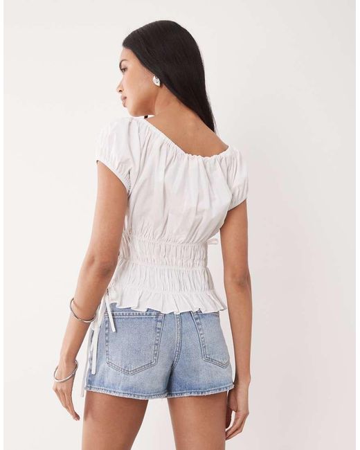 The Frolic White Exclusive Cotton Shirred Tie Side Detail Top