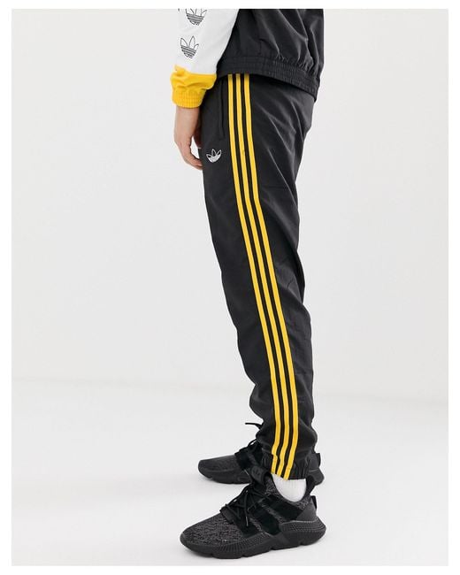 Adidas Originals – Gewebte Jogginghose mit 3 Streifen in Black für Herren