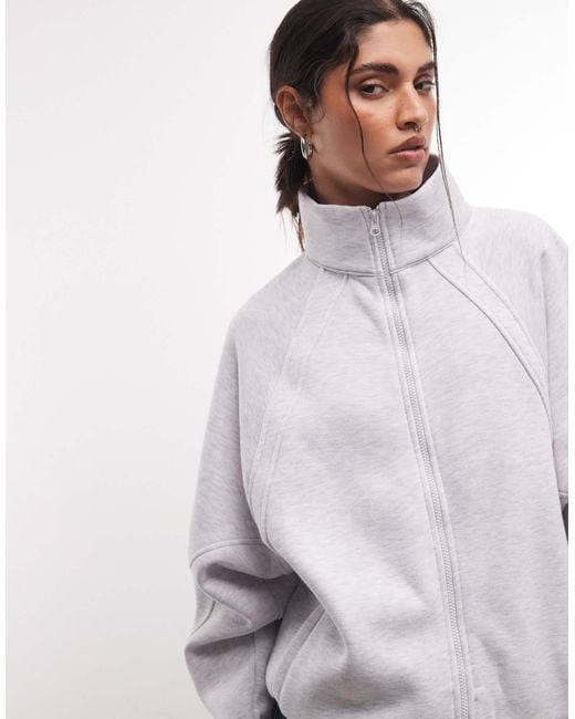 Haut Collusion en coloris White