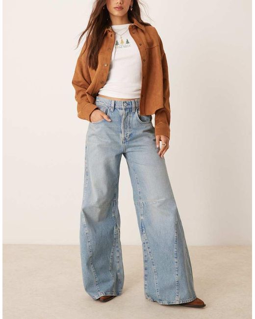 Vaqueros De Campana De Talle Alto Y Corte Holgado Con Lavado Azul Medio Eden De Free People de color Blue