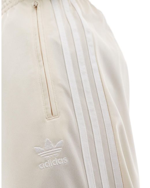 Adidas Originals White Firebird Track Pants for men
