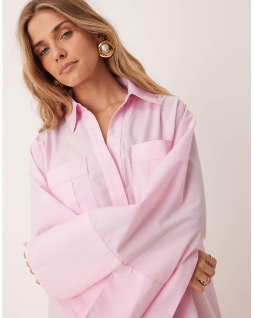 Robe chemise courte à rayures avec revers larges et poches oversize - bonbon ASOS en coloris Pink