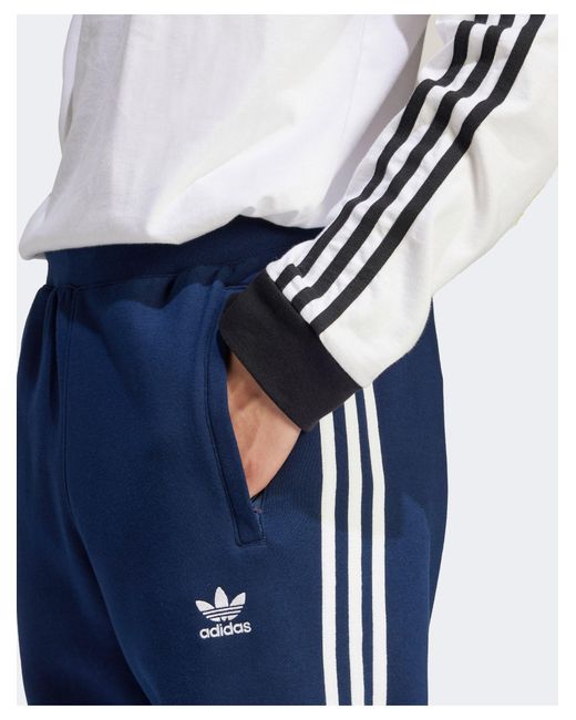 Adidas Originals Blue 3 Stripes Track Pants for men