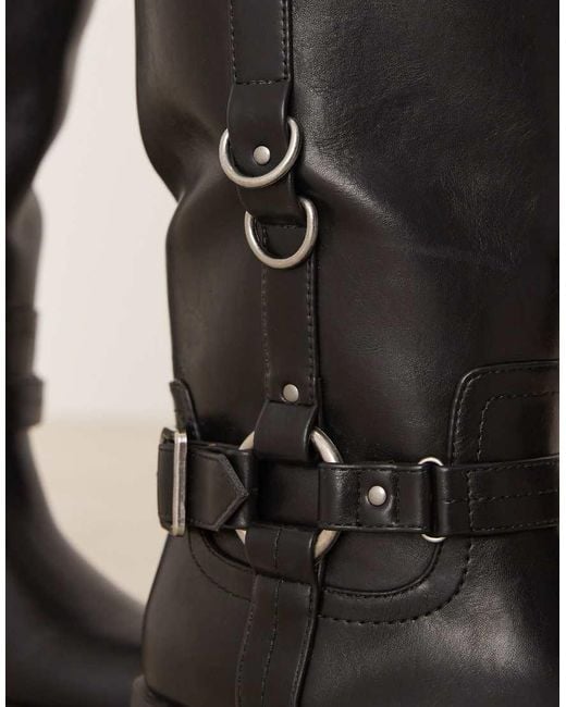 ASOS Black Curve Cobra Buckle Harness Knee Boots With Silver Hardware