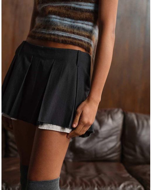 Monki Brown Pleated Mini Skirt With Frayed Edge And Pocket Detail