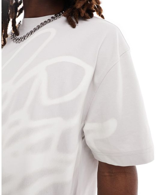 T-shirt oversize unisex beige con grafica stampata di Weekday in White