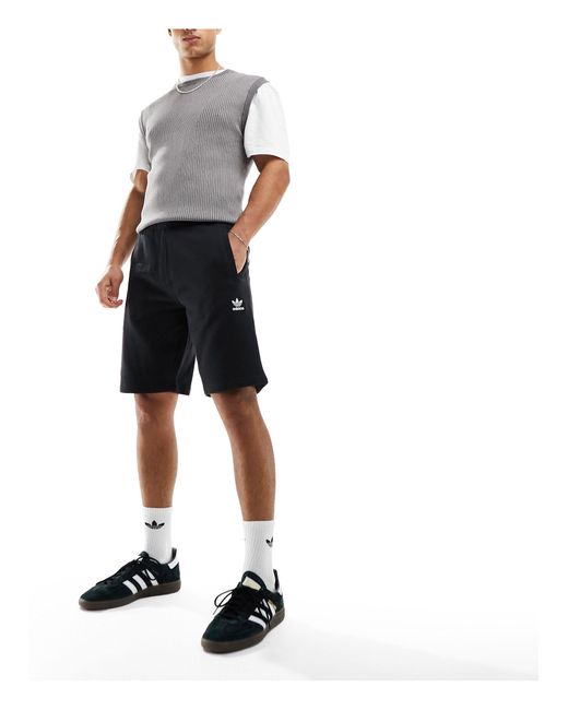 Trefoil essentials - pantaloncini neri con logo di Adidas Originals in Black da Uomo