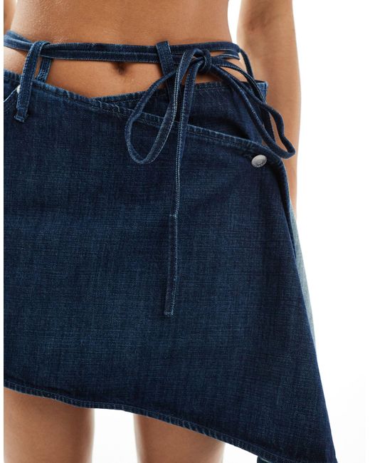 Gate - mini-jupe d'ensemble en jean coupe asymétrique - saphir Weekday en coloris Blue
