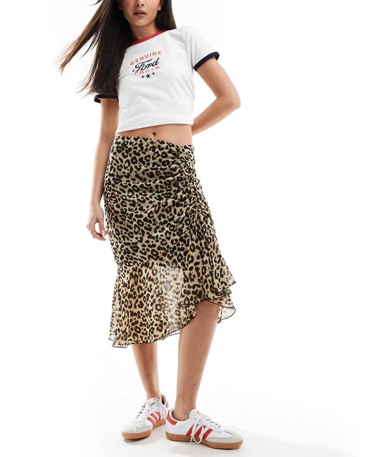 Jupe mi longue a imprime leopard et ourlet asymetrique Mango en coloris Marron Lyst