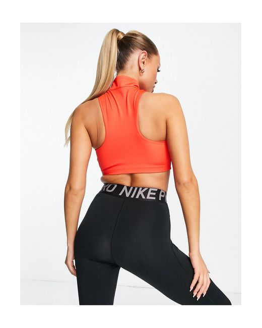 Sujetador deportivo estilo top corto Nike de color Orange