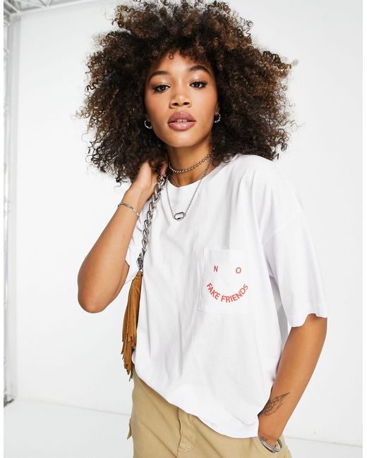 ASOS Oversized T-shirt With No Fake Friends Graphic Pocket Logo in ...