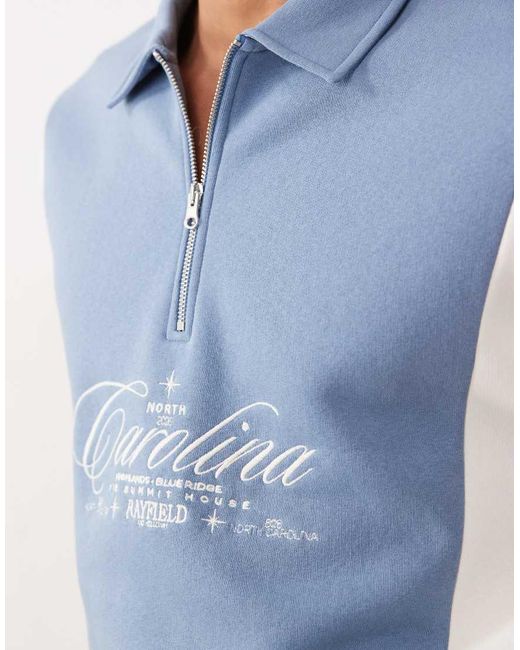 ASOS Blue Relaxed Quarter Zip With Cut & Sew Panels And Embroidered Print for men