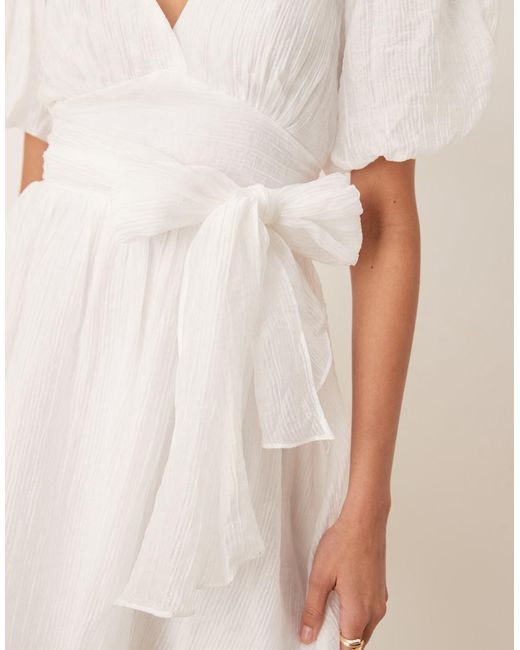 Gina Tricot Natural Short Sleeve V Neck Open Back Bow Graduation Mini Dress