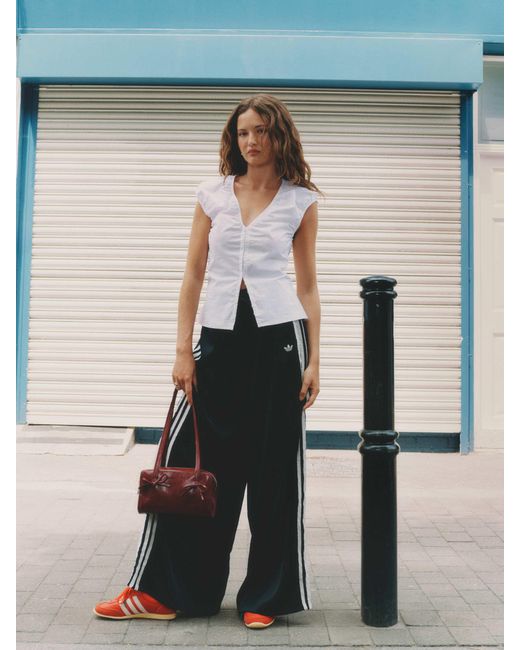 Adidas Originals Black – jogginghose aus em satin mit 3 gerüschten streifen