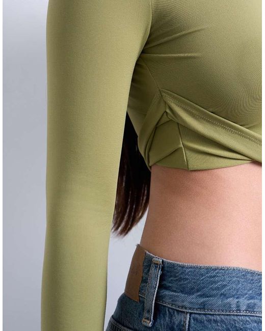 Top De Manga Larga Con Detalle Retorcido En El Lateral De TOPSHOP de color White