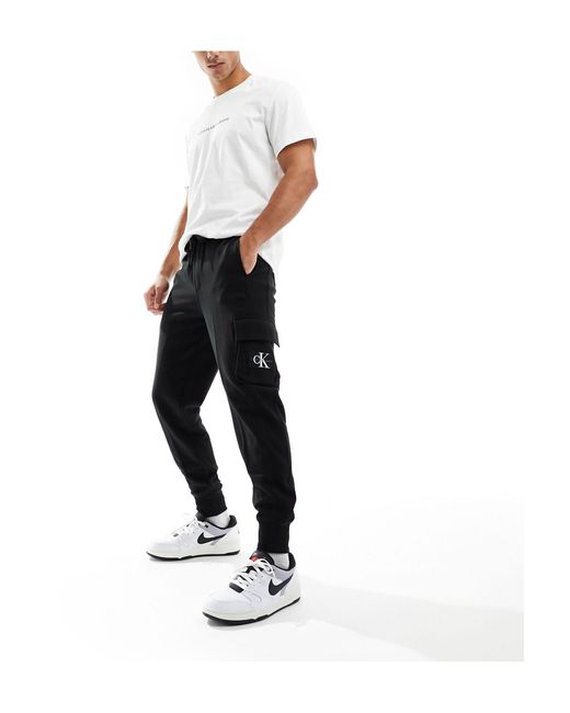 Pantalones negros con parche Calvin Klein de hombre de color White