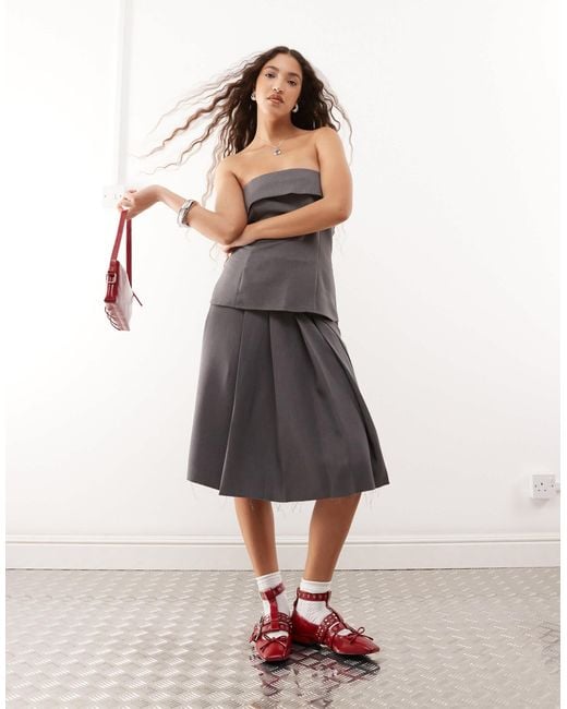 Jupe kilt d'ensemble plissée coupe ajustée Collusion en coloris White