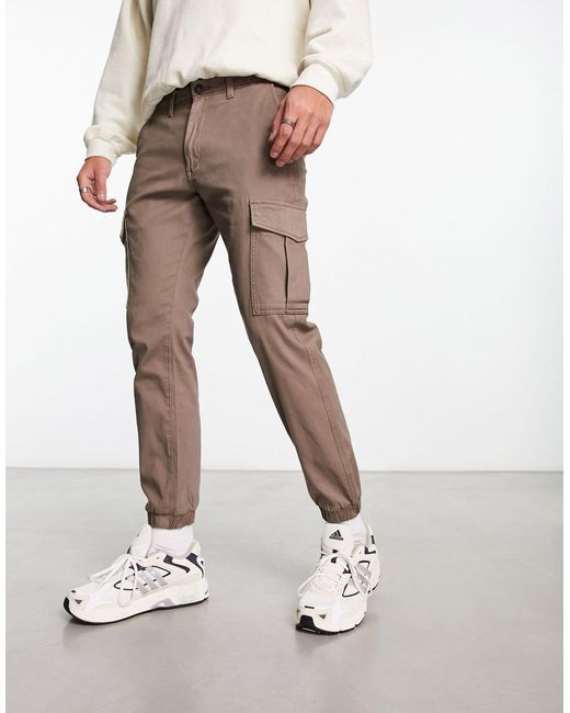 Intelligence - pantaloni cargo marroni con fondo elasticizzato da Uomo di  Jack & Jones in Neutro | Lyst