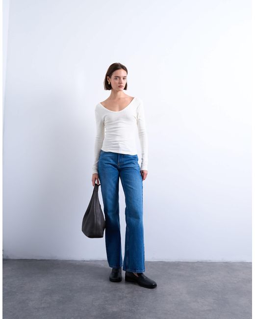 Top côtelé à manches longues avec col v et ourlet incurvé - écru TOPSHOP en coloris White