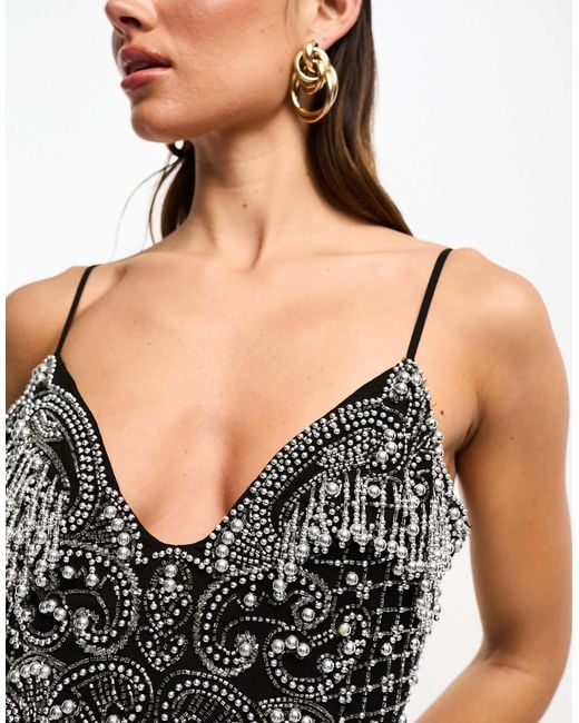 embellished cami mini dress with flippy hem in black Mindy Black Shimmer Detail Sequin Top Cami Strap Mini Dress  Get That Trend