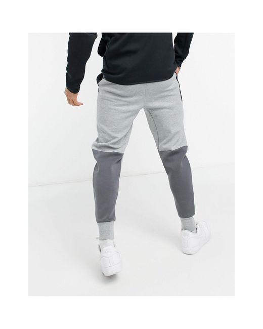 Joggers tecniciNike in Pile da Uomo colore Grigio | Lyst