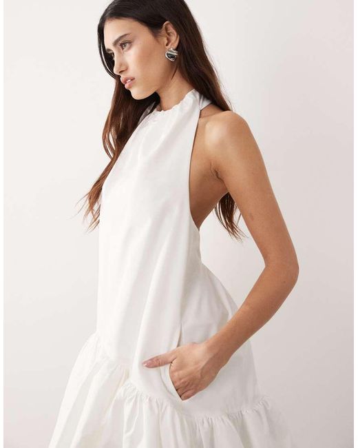 ARRANGE Natural Halter Bubble Hem Mini Dress