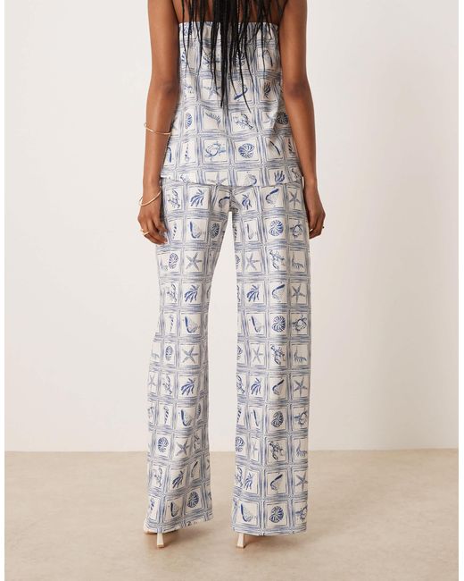 Pantalon d'ensemble ample à imprimé coquillages - bleu ASOS en coloris Natural